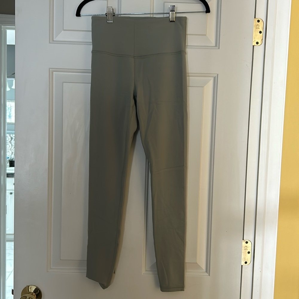 Light sage athleta leggings size extra small.  Only worn a few times.
